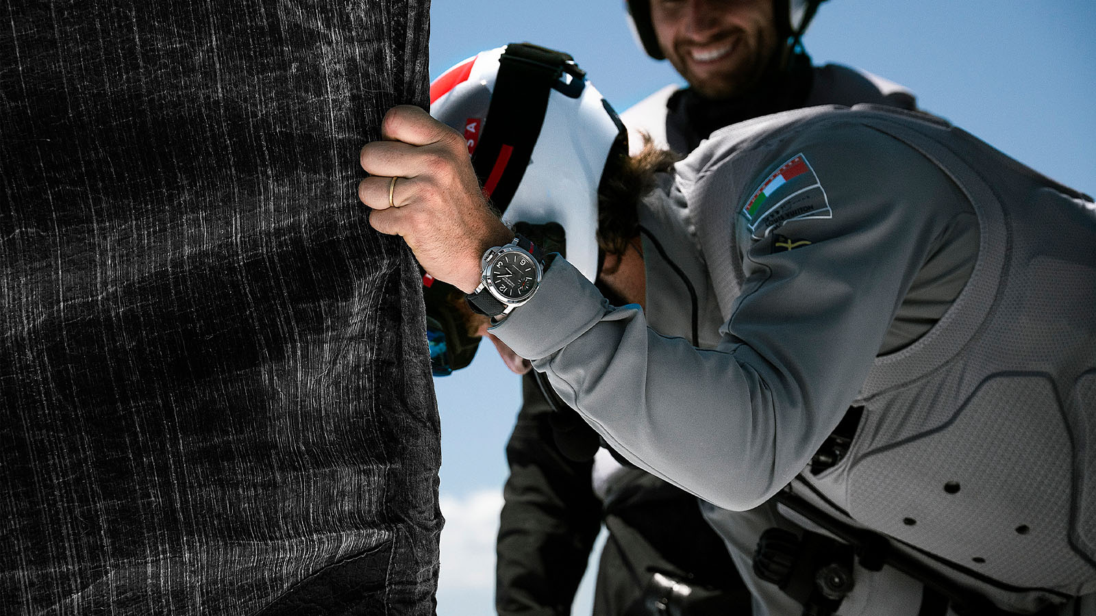 A shared journery of values, luna Rossa team with watch display