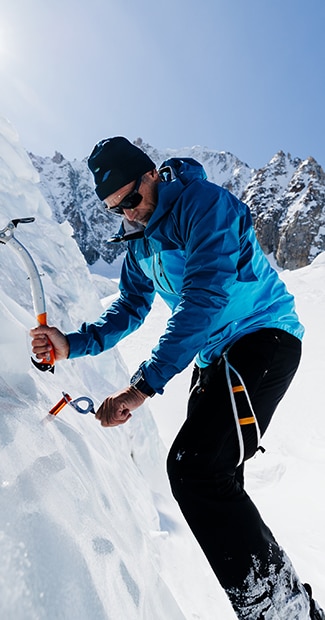 Mike Horn in snow gear on a snowy mountain
